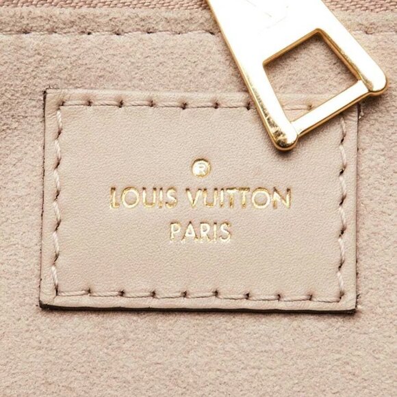 Louis Vuitton Gris Tourterelle Monogram Empreinte Leather Onthego MM Bag - Picture 9 of 9